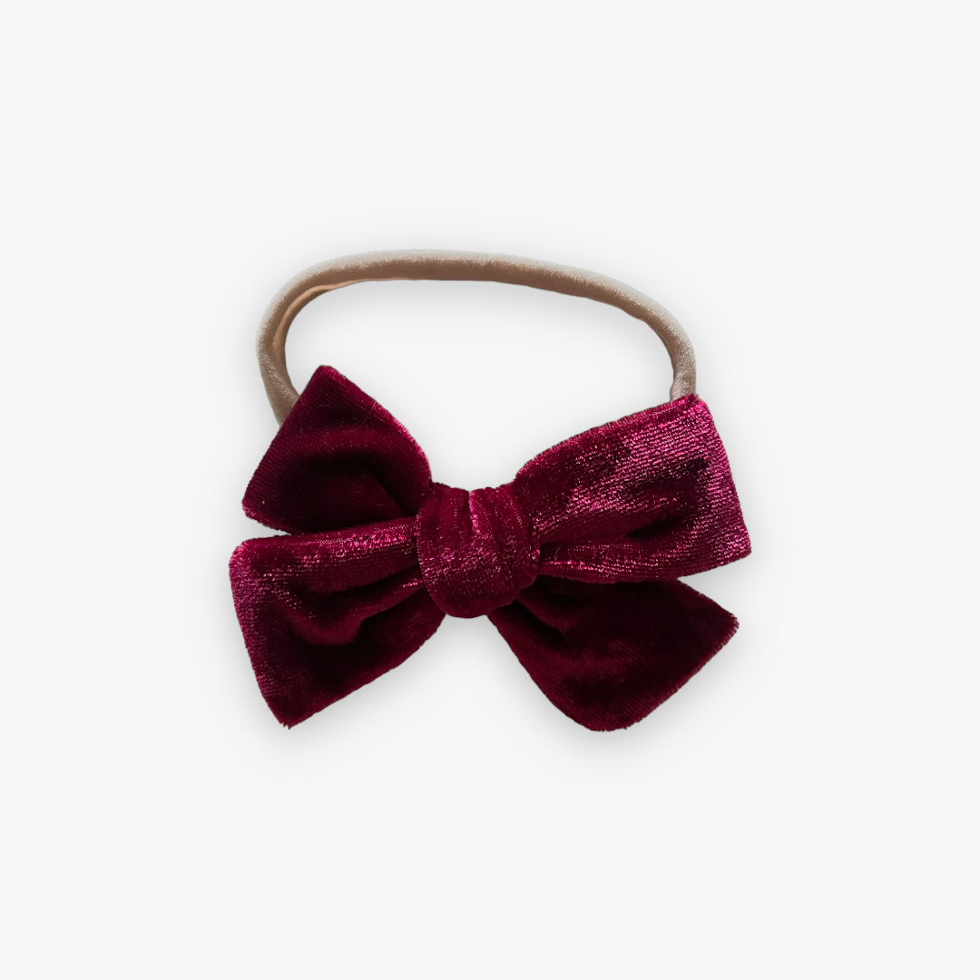 pinwheel bow on band || cranberry velvet