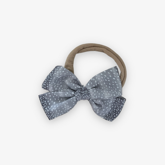 pinwheel bow on band || doe